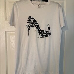 White Graphic Tee with Black Shoe Design